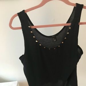 Black tank with gold pyramid grommets
